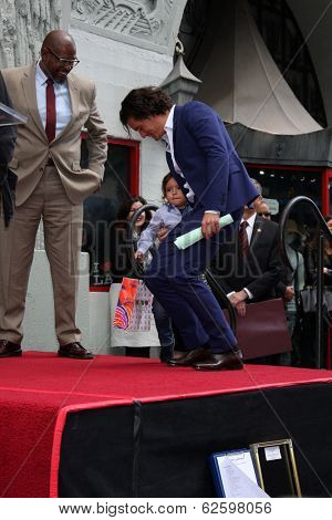 LOS ANGELES - APR 2:  Orlando Bloom, Flynn Bloom at the Orlando Bloom Hollywood Walk of Fame Star Ceremony at TCL Chinese Theater on April 2, 2014 in Los Angeles, CA