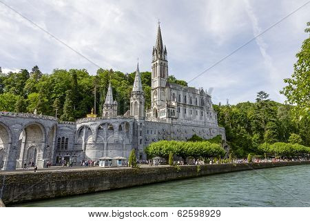 The Basilica Of Lourdes At Gave De Pau River