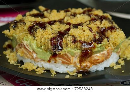 Sushi rolls with vassabi on the plate