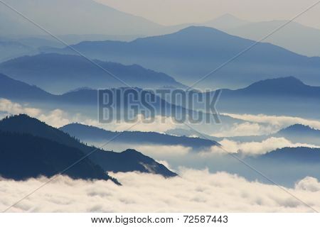 Blue and foggy mountains