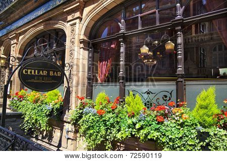 Luxury public house in Mayfair, decorated with flower baskets