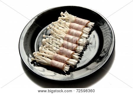 Golden Mushroom Wraping With Bacon Boil