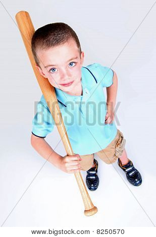 Young Boy Holding A Baseball Bat