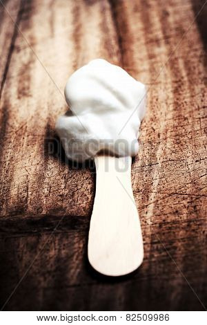Vanilla Soft Ice Cream On A Stick  Over Wooden Table. Ice-cream