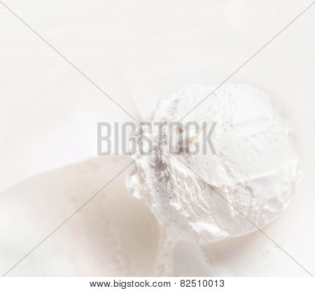 Vanilla Ice Cream Scoop Closeup. White  Ice Cream Background