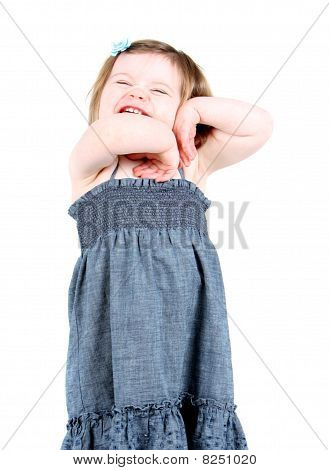 Adorable little girl with hands on her face