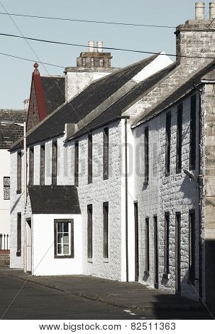 White Old Facades In St Margareth Hope. Orkney. Scotland