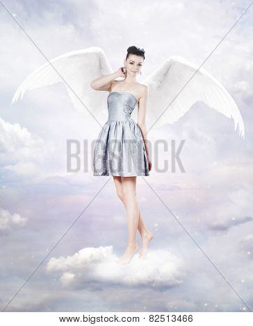 Beautiful Brunette Woman As Angel In Heaven