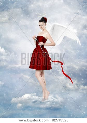 Beautiful Brunette Woman As Cupid With Key To Heart