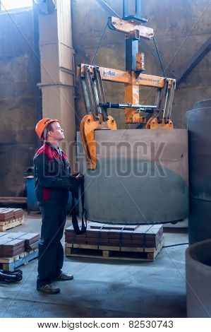 Worker moves prepared unit to warehouse