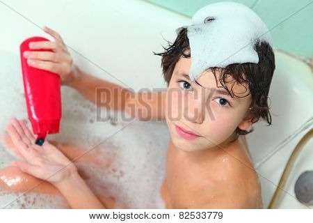 Handsome Preteen Boy With Shampoo Take Soap Bath And Wash His Head
