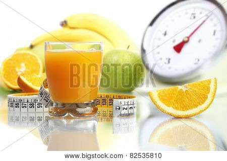 orange juice in glass fruit meter scales diet food
