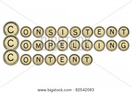 consistent, compelling content - word abstract  in old round typewriter keys isolated on white