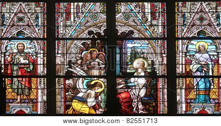 VIENNA, AUSTRIA - OCTOBER 11: Saint Cecilia, stained glass in Minoriten kirche in Vienna, Austria on October 11, 2014.