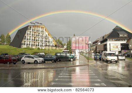 ZABLJAK, MONTENEGRO - JULY 27, 2014: rainbow on downtown Zabljak in the Durmitor mountain region and with an altitude of 1,456 metres, it is the highest situated town on the Balkans. Shot in 2014