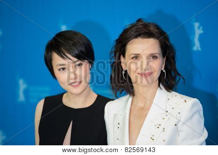 BERLIN, GERMANY - FEBRUARY 05: Rinko Kikuchi, Juliette Binoche, 'Nobody Wants the Night'. 65th Berlinale International Film Festival at Grand Hyatt Hotel on February 5, 2015 in Berlin, Germany.