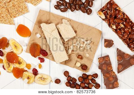Delicious sweets on wood background