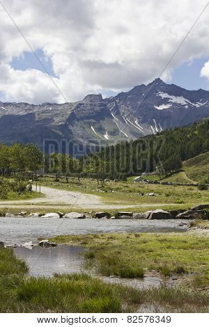 Mountain Path In Madesimo Valley Floor At Summe