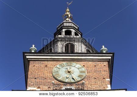 Clock On The Town Hall Tower In Cracow, Poland