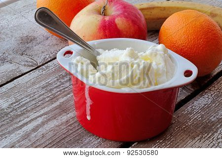 White Ice Cream In Red Bowl
