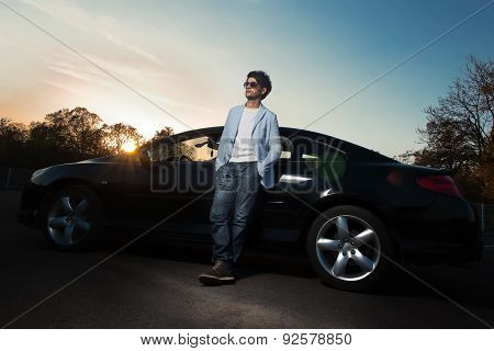 Handsome Young Man Leaning On His Car. Attractive Gorgeous Guy Standing, Outdoors - Outside