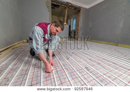 pipefitter installing system of heating