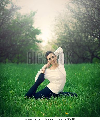 Beautiful Girl Is Engaged In Yoga In The Forest