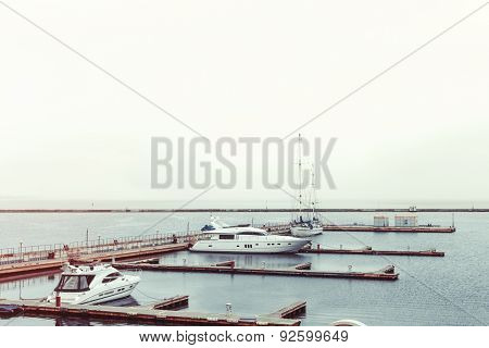 Luxury Yachts Parked In A Bay On The Sea
