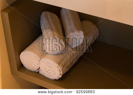 Bathroom Towels Arranged On A Shelf