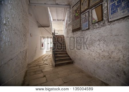 Cabra Spain - September 5 2010: Interior of bullring of Cabra is based on a popular architecture being built with masonry brick and wood debuted as a bullfighter on April 16 1933 Sunday of resurrection the Bullfighter Manuel Rodríguez "Manolete" together
