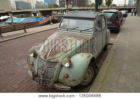 ROTTERDAM, THE NETHERLANDS - SEPTEMBER 21: Classic car, Citroen 2CV parked on the street. The 2CV was a popular small car built from 1948 to 1990.