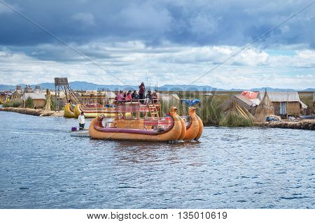 Traditional Village On Floating Islands On Lake Titicaca In Peru, South America