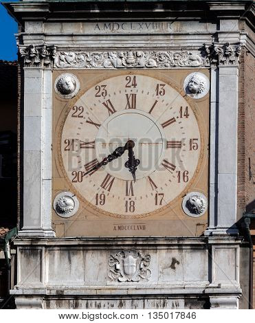 The clock on the Torre dell'Orologio the Clock Tower of the Modena Town Hall a part of the Modena's UNESCO World Heritage Site