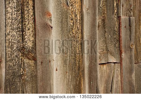 Wood boards from historical barn with golden tones
