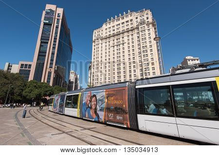 Rio de Janeiro, Brazil - June 13, 2016: New city tram VLT passing Maua Square. Recently inaugurated, it is the newest mode of public transportation, and is free of charge for the first weeks of use.
