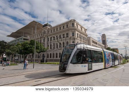 Rio de Janeiro, Brazil - June 13, 2016: New city tram VLT passing Maua Square. Recently inaugurated, it is the newest mode of public transportation, and is free of charge for the first weeks of use.