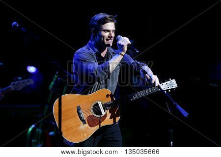 NEW YORK-APR 30: Chris Carmack performs onstage during the 'Nashville' Tour at The Beacon Theatre on April 30, 2015 in New York City.