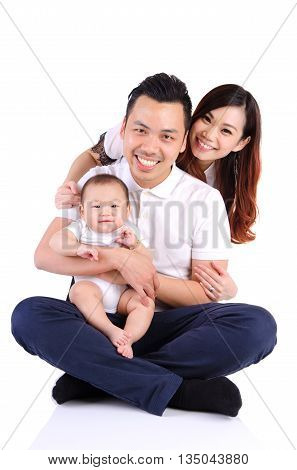 Indooor portrait of beautiful asian family on white background