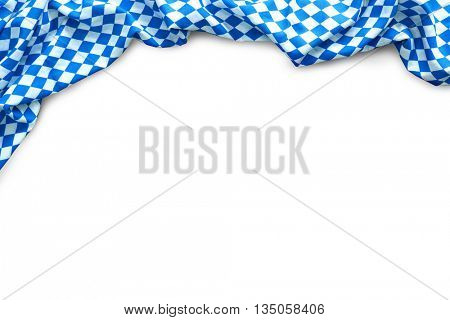 Background for Oktoberfest with bavarian white and blue fabric isolated on white