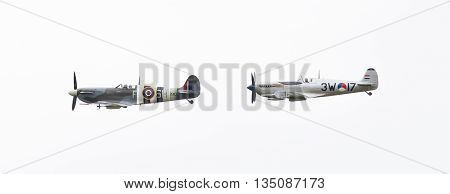 Leeuwarden, The Netherlands - June 10, 2016: Vintage Spitfire Fighter Planes Making A Low Flypast Fo