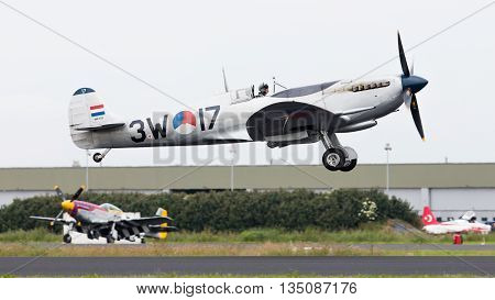 Leeuwarden, The Netherlands - June 10, 2016: A Vintage Spitfire Fighter Plane Makes A Low Flypast Fo