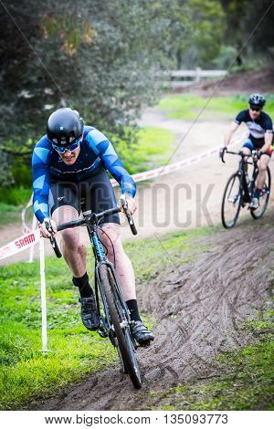 MELBOURNE, AUSTRALIA - JUNE 20: Competitors compete in Rnd 1 of the Dirty Deeds Cyclocross Series 2016