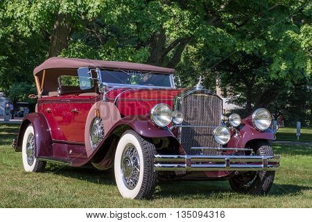 GROSSE POINTE SHORES MI/USA - JUNE 19 2016: A 1938 Pierce Arrow Sport Phaeton car at the EyesOn Design car show, held at the Edsel and Eleanor Ford House, near Detroit, Michigan.