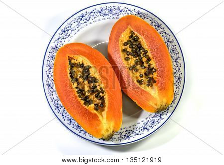 papaya in ceramic plate isolated on white