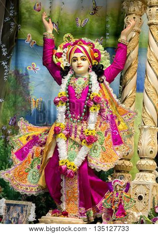 Durban, South Africa - March 20, 2016: Hindu God Krishna. Bright colorful sculptural composition. Artistic retouching.