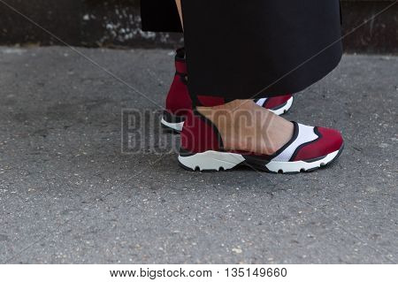MILAN ITALY - JUNE 18: Detail of shoes outside Marni fashion show building for Milan Men's Fashion Week on JUNE 18 2016 in Milan.