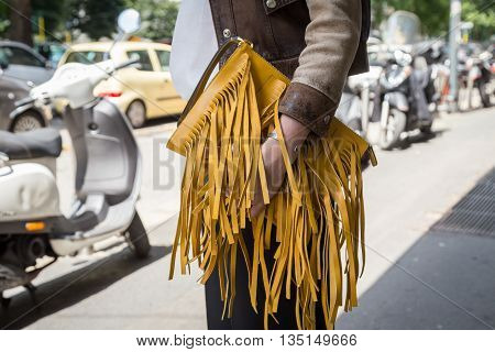 MILAN ITALY - JUNE 18: Detail of bag outside Marni fashion show building for Milan Men's Fashion Week on JUNE 18 2016 in Milan.