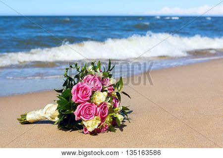 wedding bouquet the bride on background of the sea