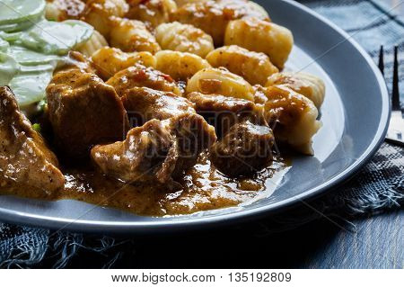 Italian Potato Dumplings With Stew And Cucumber Salad