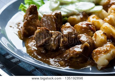 Italian Potato Dumplings With Stew And Cucumber Salad